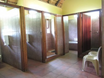 Communal bathroom and shower facilities for two-bed rondavel guests at Hilltop Camp